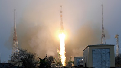 In this photo provided by Roscosmos Space Agency Press Service, the Progress MS-16 cargo blasts off from the launch pad at Russia's space facility in Baikonur, Kazakhstan, Monday, Feb. 15, 2021.