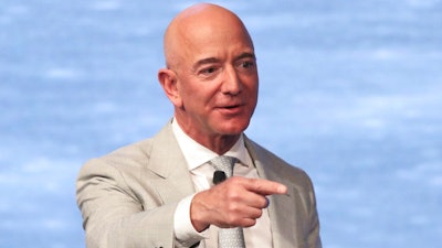In this June 19, 2019, file photo, Amazon founder Jeff Bezos speaks during the JFK Space Summit at the John F. Kennedy Presidential Library in Boston. Bezos is one of the 50 Americans who gave the most to charity in 2020, according to the Chronicle of Philanthropy’s annual rankings.
