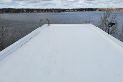 Final installation of recycled roof in Holland, MI.