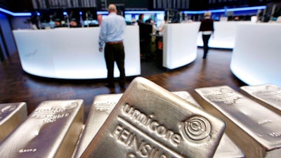 In this file photo dated Wednesday, May 9, 2007, Silver bullion, bars weighing five kilograms each, are displayed in the trading room of the stock exchange in Frankfurt, Germany. Silver futures jumped more than 10% on Monday Feb. 1, 2021, following strong gains over the weekend.