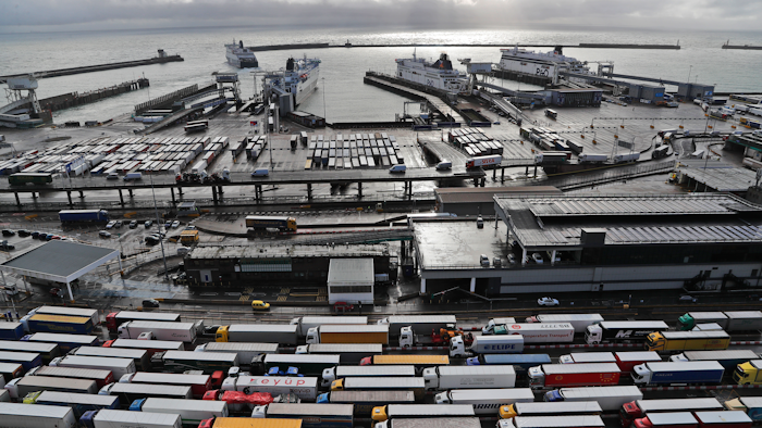 In this file photo, lorries queue at Check-in at the port in Dover, Britain, before entering the EU.