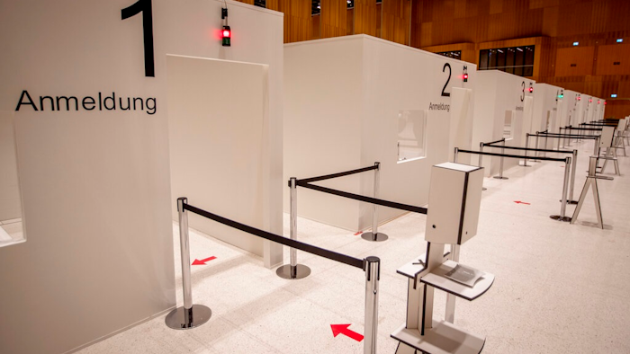 In this file photo dated Monday, Dec. 7, 2020, cabins of a vaccine center that was introduced to the media are seen in Wiesbaden, Germany. With accusations of being slow off the blocks in the race to immunize its citizens against COVID-19, Germany faces the problem of having a glut of vaccines and not enough arms to inject. With its national vaccine campaign lagging far behind that of Israel, Britain and the United States, there are growing calls in this country of 83 million to ditch or rewrite the rulebook.