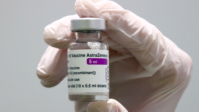 In this file photo, medical staff prepares an AstraZeneca coronavirus vaccine.