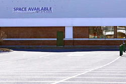 A 'Space Available' real estate sign is posted on the facade of a closed supermarket on March 2 in Manchester, NH.