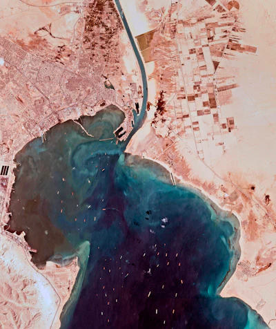 This satellite photo from Planet Labs Inc. shows the Ever Given cargo ship stuck in Egypt's Suez Canal as a mass of ships wait in the Red Sea to pass through the waterway on Monday, March 29.