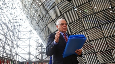 European Union foreign policy chief Josep Borrell speaks to the media prior to a meeting of the European Foreign Affairs Ministers, at the European Council headquarters in Brussels, Monday, March 22, 2021.