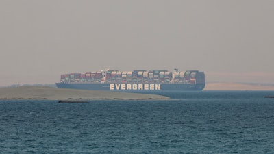 Ever Given, a Panama-flagged cargo ship, is seen in Egypt's Great Bitter Lake Tuesday, March 30, 2021.