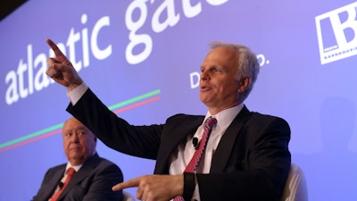 In this June 24, 2015 file photo, David Neeleman, right, talks to journalists during a joint news conference in Lisbon.