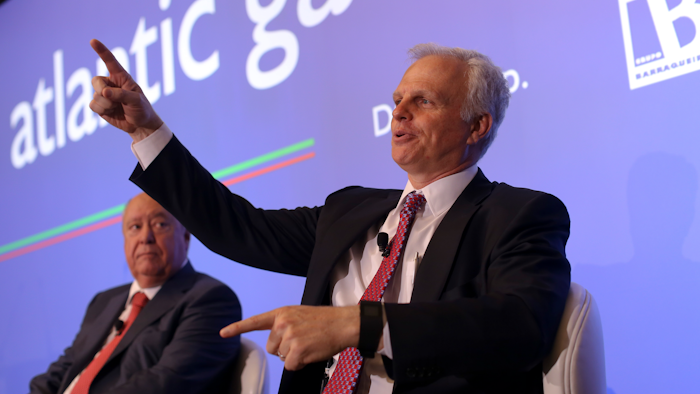 In this June 24, 2015 file photo, David Neeleman, right, talks to journalists during a joint news conference in Lisbon.