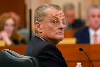 Bill Magness, President and CEO of the Electric Reliability Council of Texas (ERCOT), testifies as the Committees on State Affairs and Energy Resources hold a joint public hearing to consider the factors that led to statewide electrical blackouts, Thursday, Feb. 25, 2021, in Austin, Texas. The hearings were the first in Texas since a blackout that was one of the worst in U.S. history, leaving more than 4 million customers without power and heat in subfreezing temperatures.