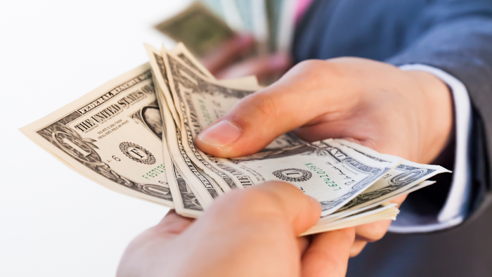 Business Man Giving Bank Notes To Another Person 516934262 2125x1416 (1)