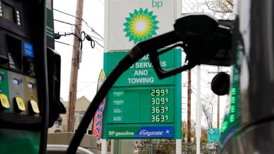 In this file photo dated Tuesday, Nov. 12, 2013, a sign at a BP filling station in Lakewood, N.J., USA. Energy company BP said Tuesday April 27, 2021, it will be returning around half a billion dollars to shareholders.
