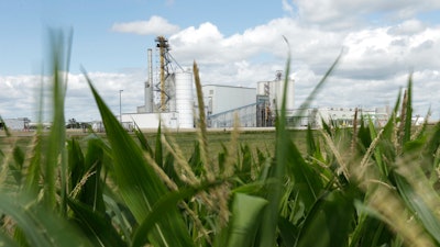 In this file photo, an ethanol plant stands next to a cornfield near Nevada, Iowa.