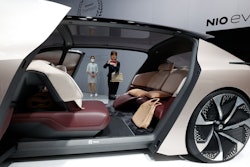 A visitor looks at the NIO eve concept car displayed during the Shanghai Auto Show in Shanghai on Monday, April 19, 2021.