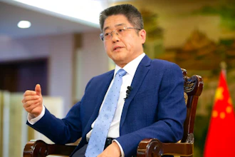 Chinese Vice Minister of Foreign Affairs Le Yucheng speaks during an interview with the Associated Press at the Ministry of Foreign Affairs in Beijing, Friday, April 16, 2021. Le spoke to AP on a wide range of issues during an interview on Friday including climate change and US-China relations.