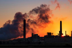 In this file photo, the Dave Johnson coal-fired power plant is silhouetted against the morning sun in Glenrock, Wyoming.