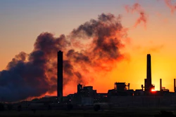 In this July 27, 2018, file photo, the Dave Johnson coal-fired power plant is silhouetted against the morning sun in Glenrock, Wyo. More than 300 businesses and investors are calling on the Biden administration to set an ambitious climate change goal that would cut U.S. greenhouse gas emissions by at least 50% below 2005 levels by 2030.