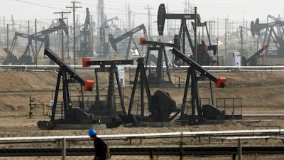 In this Jan. 16, 2015, file photo, pumpjacks are seen operating in Bakersfield, Calif. On Friday, April 23, 2021, California Gov. Gavin Newsom announced he would halt all new fracking permits in the state by January 2024. He also ordered state regulators to plan for halting all oil extraction in the state by 2045.