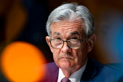 In this Dec. 1, 2020 file photo, Federal Reserve Chair Jerome Powell listens during a Senate Banking Committee hearing on Capitol Hill in Washington. Powell on Thursday, April 8, 2021 said the U.S. economy, boosted by quickening vaccinations and signs of rapid hiring, is headed toward a strong recovery, though he cautioned not all will immediately benefit.