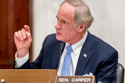 In this May 20, 2020, file photo, Sen. Tom Carper, D-Del., speaks as the Senate Homeland Security and Governmental Affairs committee meets on Capitol Hill in Washington. Sen. Carper is urging U.S. anti-pollution standards that would follow a deal brokered by California with five automakers and then set targets to end sales of new gas-powered vehicles by 2035. In a letter sent late Thursday, April 29, 2021, to the Environmental Protection Agency, Carper says the administration must move forcefully in the auto sector to achieve Biden’s plan of slashing America’s greenhouse gas emissions in half by 2030.