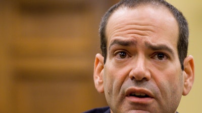 In this file photo Neil Barofsky testifies before the House Appropriations Subcommittee on Capitol Hill in Washington.