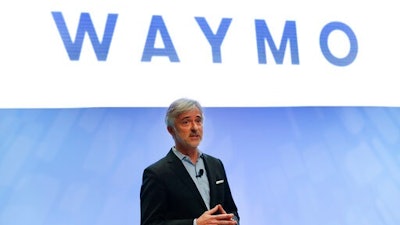 In this Sunday, Jan. 8, 2017, file photo, John Krafcik, CEO of Waymo, the autonomous vehicle company created by Google's parent company, Alphabet speaks at the North American International Auto Show in Detroit. The executive who steered the transformation of Google’s self-driving car project into a separate company worth billions of dollars is stepping down after more than five years on the job. Krafcik announced his departure as CEO of Waymo, a company spun out from Google, in a Friday, April 2, 2021, blog post that cited his desire to enjoy life as the world emerges from the pandemic.