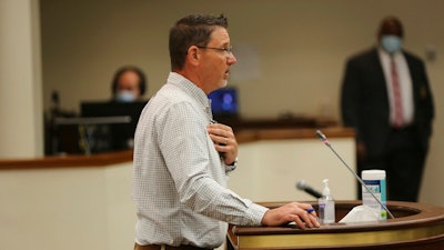 South Bend Winery owner Larry Cozine testifies about a bill allowing wine giant E & J Gallo Winery to open wine tasting rooms as part of building a new $400 million bottling plant and distribution center in South Carolina on Thursday, April 22, 2021, in Columbia, S.C. Cozine recently opened his winery in Greenwood, South Carolina.