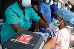 Hospital staff in Lagos, Nigeria, administer the AstraZeneca vaccine.