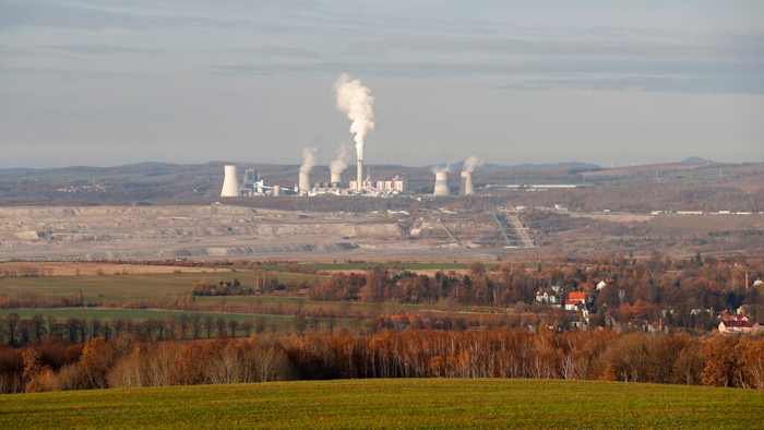 This Tuesday, Nov. 19, 2019 file photo shows the Turow lignite coal mine and Turow power plant near the town of Bogatynia, Poland. European Union's top court has on Friday, May 21, 2021 ordered Poland to immediately stop extracting brown coal at the Turow mine on the border with the Czech Republic and Germany. The Czech Republic filed in March for an injunction, saying the mine drains away water from its inhabited areas.