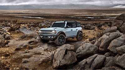 This photo provided by Ford Motor Company shows the 2022 Ford Bronco. The Bronco is an example of an off-road ready SUV with standard four-wheel-drive and rugged body-on-frame construction