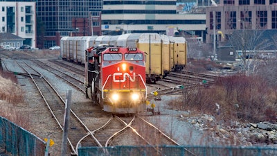 A Canadian National Rail locomotive moves through the rail yard in Dartmouth, Nova Scotia, on March 29, 2018.