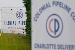 In this May 12, 2021, file photo, the entrance of Colonial Pipeline Company in Charlotte, N.C. U.S. pipeline operators will be required for the first time to conduct a cybersecurity assessment under a Biden administration directive to be issued Thursday in response to the ransomware hack that disrupted gas supplies in several states this month.