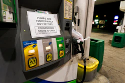 A pump at a gas station in Silver Spring, Md., is out of service, notifying customers they are out of fuel, Thursday, May 13, 2021. Motorists found gas pumps shrouded in plastic bags at tapped-out service stations across more than a dozen U.S. states Thursday while the operator of the nation's largest gasoline pipeline reported making 'substantial progress' in resolving the computer hack-induced shutdown responsible for the empty tanks.
