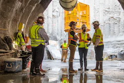 U.S. Secretary of Transportation Pete Buttigieg, center, receives a tour of an underground tunnel for the expansion of the Hartsfield–Jackson Atlanta International Airport plane train tunnel.