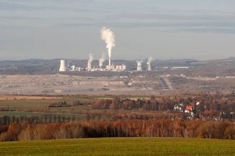 This Tuesday, Nov. 19, 2019 file photo shows the Turow lignite coal mine and Turow power plant near the town of Bogatynia, Poland. European Union's top court has on Friday, May 21, 2021 ordered Poland to immediately stop extracting brown coal at the Turow mine on the border with the Czech Republic and Germany. The Czech Republic filed in March for an injunction, saying the mine drains away water from its inhabited areas.