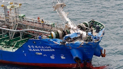 This photo shows a chemical tanker, Ulsan Pioneer after a collision on the coast of Imabari, Ehime prefecture, southern Japan Friday, May 28, 2021.