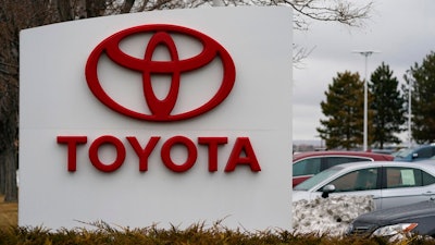 The company logo adorns a sign outside a Toyota dealership Sunday, March 21, 2021, in Lakewood, Colo. Toyota reported Wednesday, May 12, 2021, its January-March profit more than doubled from the previous year to 777 billion yen ($7 billion), as the Japanese automaker’s sales gradually recovered from the damage of the coronavirus pandemic.