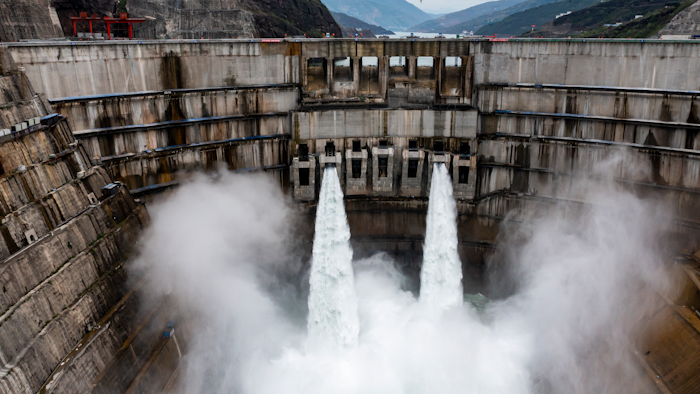 In this photo released by Xinhua News Agency, water is released from the dam of Baihetan hydropower station in Ningnan county, in southwestern China's Sichuan province on June 27, 2021.