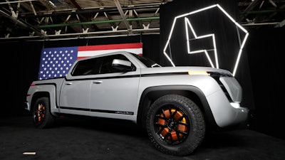 In this June 25, 2020 file photo, the electric Endurance pick-up truck at Lordstown Motors Corporation is shown, in Lordstown, Ohio. Lordstown Motors CEO Steve Burns and Chief Financial Officer Julio Rodriguez have resigned from the startup commercial electric vehicle maker.