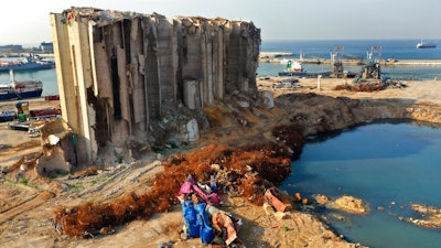 Rubble and debris around towering grain silos gutted in an August 2020 explosion, Beirut, Lebanon, Dec. 2, 2020.