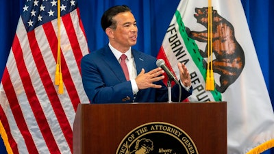 In this April 23, 2021, file photo, California Attorney General Rob Bonta speaks in Sacramento, Calif. Officials from California, New York and other states urged the Environmental Protection Agency June 2, to allow California to set its own automobile tailpipe pollution standards.