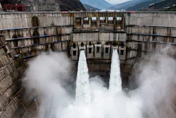 In this photo released by Xinhua News Agency, water is released from the dam of Baihetan hydropower station in Ningnan county, in southwestern China's Sichuan province on June 27, 2021.