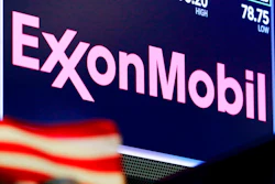 In this April 23, 2018, file photo, the logo for ExxonMobil appears above a trading post on the floor of the New York Stock Exchange. Exxon Mobil shareholders have unseated a third board member in their bid to force the oil giant to deal more aggressively with climate change. The company announced Wednesday, June 2, 2021 that three candidates nominated by a dissident group of shareholders, called Engine No. 1, had been elected to its board of directors. Preliminary tallies had two of the challengers winning seats.