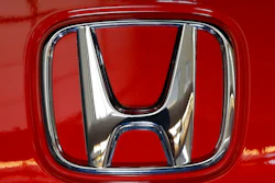 This Thursday, Feb.13, 2020 file photo shows a Honda logo on a vehicle at the 2020 Pittsburgh International Auto Show in Pittsburgh. Although General Motors will build Honda's first two fully electric vehicles for North America, in 2021 the Japanese automaker announced plans to change course and manufacture its own later in the decade.