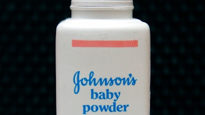 In this April 15, 2011, file photo, a bottle of Johnson's baby powder is displayed. Johnson & Johnson is asking for Supreme Court review of a $2 billion verdict in favor of women who claim they developed ovarian cancer from using the company's talc products.