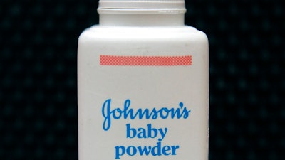 In this April 15, 2011, file photo, a bottle of Johnson's baby powder is displayed. Johnson & Johnson is asking for Supreme Court review of a $2 billion verdict in favor of women who claim they developed ovarian cancer from using the company's talc products.