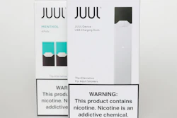 This Tuesday, Feb. 25, 2020 file photo shows packaging for an electronic cigarette and menthol pods from Juul Labs, in Pembroke Pines, Fla. Juul Labs Inc. will pay $40 million to North Carolina and take more action to prevent underage use and sales, according to a landmark legal settlement announced Monday, June 18, 2021, after years of accusations that the company had fueled an explosion in teen vaping.