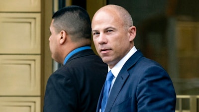 In this July 23, 2019, file photo, California attorney Michael Avenatti walks from a courthouse in New York, after facing charges. On Wednesday, June 9, 2021, Avenatti's lawyers said he should spend no more than six months behind bars after a jury concluded he tried to extort $25 million from Nike.