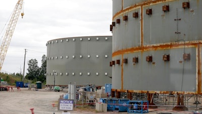 In this Sept. 21, 2016 file photo, parts of a containment building for the V.C. Summer Nuclear Station is shown near Jenkinsville, S.C., during a media tour of the facility. A former official for the contractor hired to build two nuclear reactors at the V.C. Summer plant that were never completed, pleaded guilty Thursday, June 10, 2021, to lying to federal authorities.