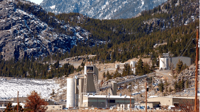 This May 2, 2013, file photo, shows the Stillwater platinum and palladium mine near Nye, Mont. Two employees died in an underground accident at the mine in south-central Montana, just north of Two workers at the mining operation have died in an underground accident, company officials said. The employees were in a utility vehicle called a side-by-side that crashed into an underground locomotive at Wednesday afternoon, June 9, said Heather McDowell, a vice president with the South Africa-based Sibanye-Stillwater, which owns the Stillwater Mining Co.